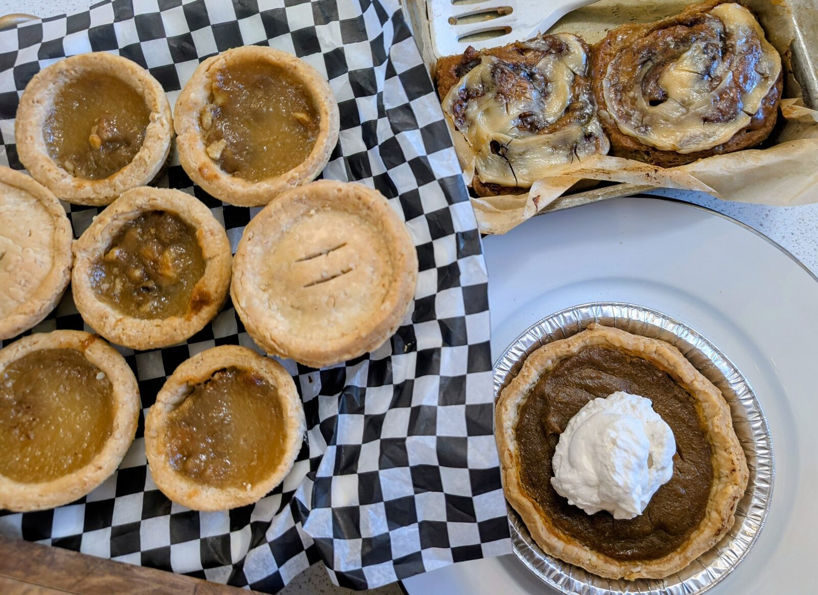 Butter tarts, cinnamon buns and a slice of pumpkin pie — bakery spread